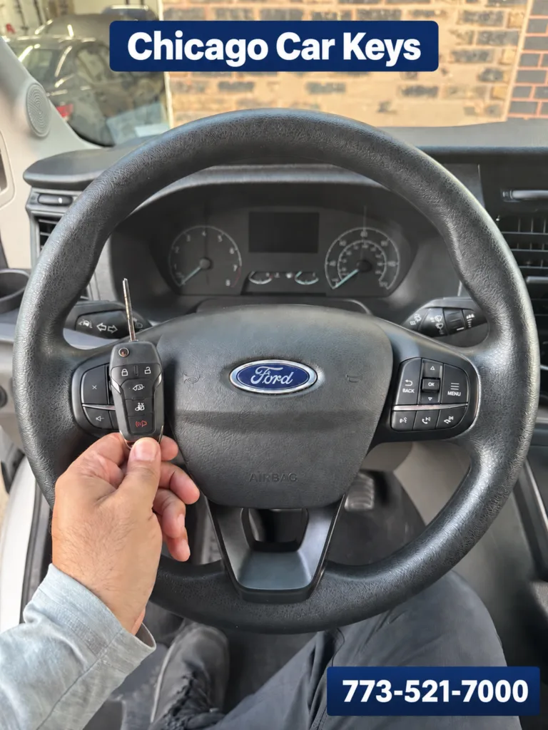Chicago Car Keys technician holding a newly created key inside a 2025 Ford Transit in Chicago