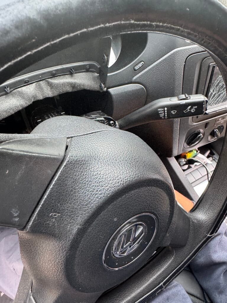 Volkswagen dashboard and steering column disassembled for ignition repair in Chicago