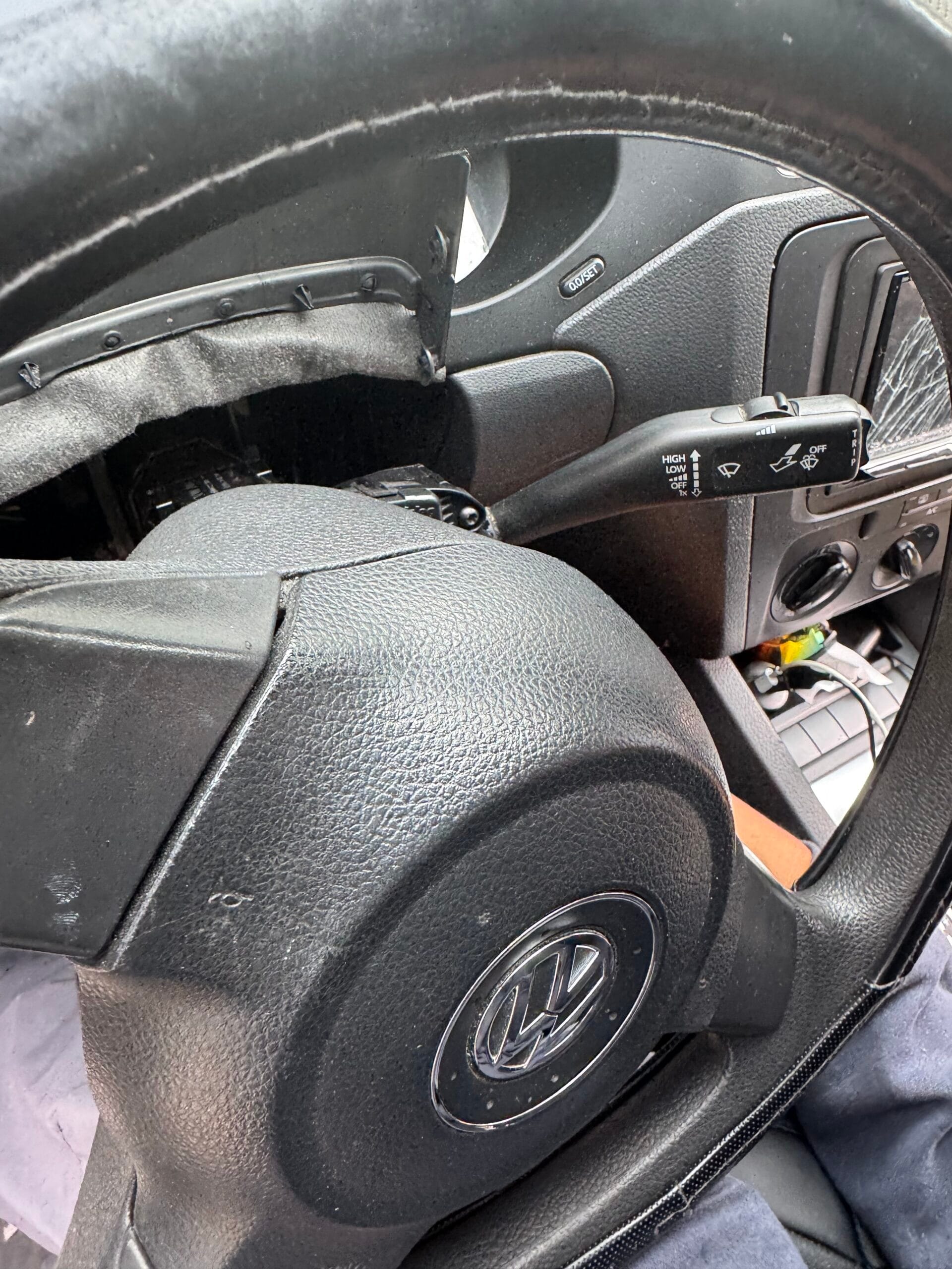 Volkswagen dashboard and steering column disassembled for ignition switch repair in Chicago