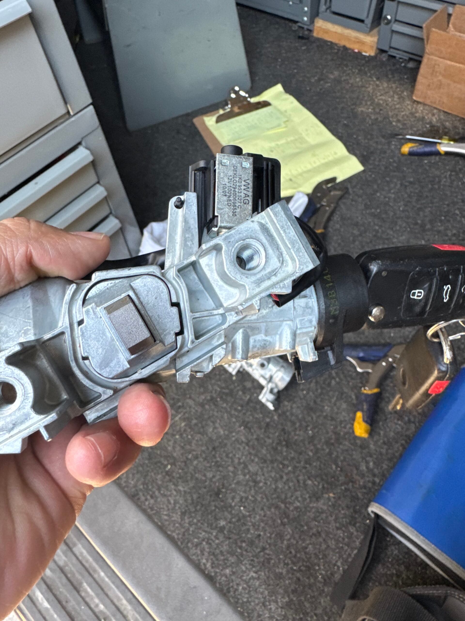 Removed Volkswagen ignition switch assembly repaired by Chicago Car Keys in Chicago